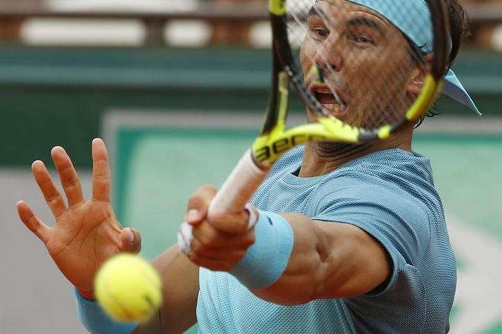 Tennis - French Open - Roland Garros - Rafael Nadal of Spain vs Facundo Bagnis of Argentina. - Paris, France - 26/05/16. Nadal returns the ball. REUTERS/Pascal Rossignol