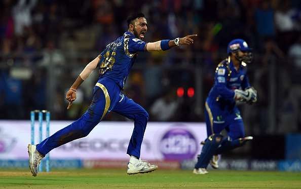 Krunal Pandya celebrates the fall of a wicket
