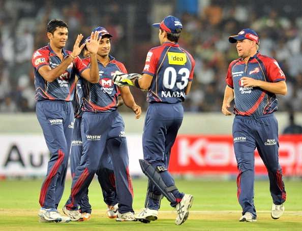 Aavishkar Salvi (left) celebrating a fall of wicket with his Delhi Daredevils teammates in the IPL