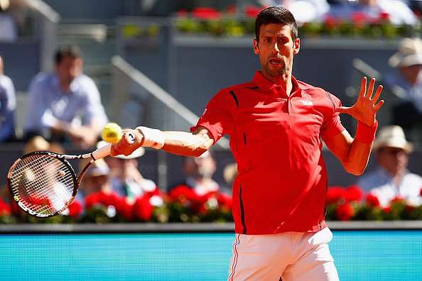 Madrid Open: Novak Djokovic and Kei Nishikori move into third round as women's seeds falter