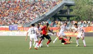 Ranti Martins tries to dribble past Penn Orji..jpg