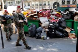 Smelly bins, pickets plague France on eve of Euro football kickoff