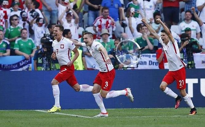 Milik delivery timely for Poles as N.Ireland lose