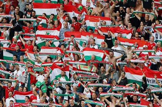 Rare Szalai goal helps Hungary beat 10-man Austria