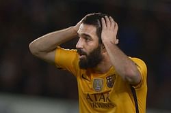 Spain's Alba speaks up for Turkish club mate Turan