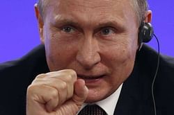 Putin says to seeks IOC intervention over Rio ban