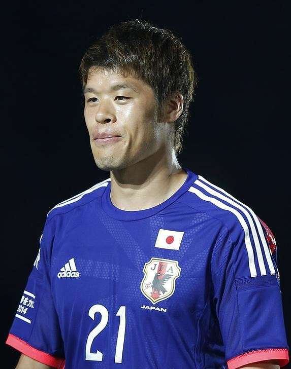Japan&#039;s national soccer team player Hiroki Sakai attends a send-off ceremony for the 2014 World Cup, in Tokyo May 25, 2014. REUTERS/Toru Hanai/Files