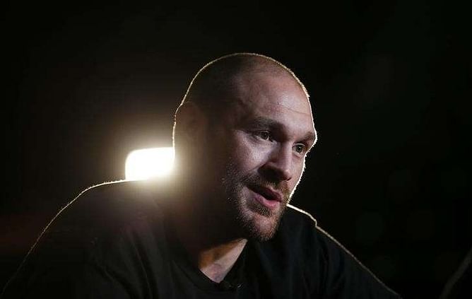 Injured Fury postpones rematch with Klitschko