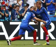 France fans want more kisses for Griezmann's boot