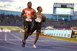 Blake completes Jamaican sprint double in Bolt's absence