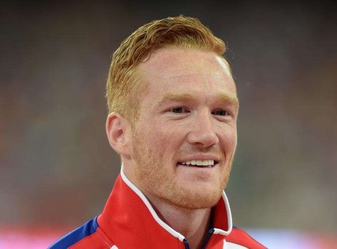 Olympics - Long jump champion Rutherford risks hearing loss