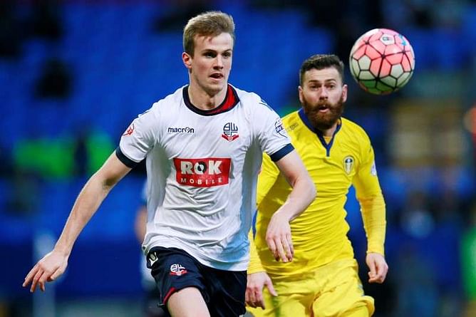 Arsenal sign young defender Holding from Bolton