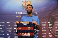 arda turan signs atletico madrid barcelona
