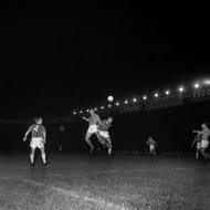 A Yugoslav player (centre, left) and a Soviet player (centre, right) jump for the ball during the final of the first-ever UEFA European Nations' Cup tournament at Parc des Princes, Paris