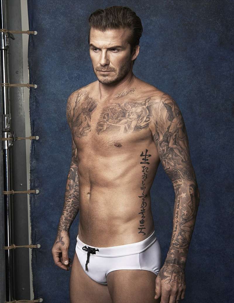 David Beckham strips topless and reveals the meaning behind his tattoos in  new advert | The Sun