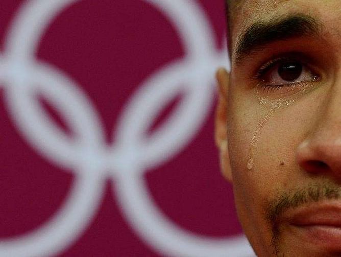 Tears and joy: capturing Olympic history on camera