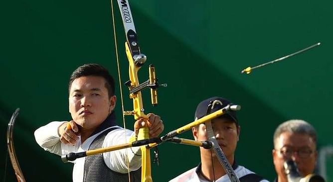 Archery - Perfect Ku shoots down U.S. redemption bid