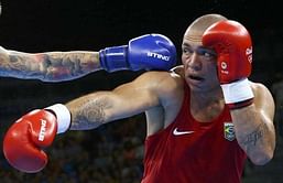 Boxing - Boxers scuffed up but happy sans headgear at Rio