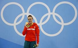 Swimming - Golden start for Australia on day of records