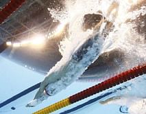 Peaty takes 100m breaststroke gold in record time