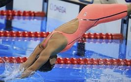 King denies tearful Efimova in 100m breaststroke
