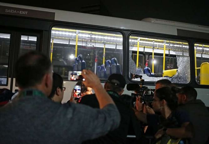 Games bus hit by gunfire, no one seriously hurt: witnesses