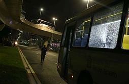 Organizers step up security around Olympic Park after bus hit by projectiles