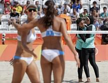 Beach Volleyball - Male pros look overdressed on skimpy Copacabana