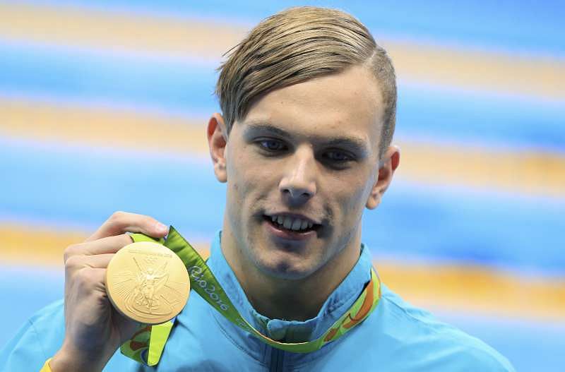 2016 Rio Olympics - Swimming - Victory Ceremony - Men&#039;s 100m Freestyle Victory Ceremony - Olympic Aquatics Stadium - Rio de Janeiro, Brazil - 10/08/2016. Kyle Chalmers (AUS) of Australia poses with his gold medal. REUTERS/Dominic Ebenbichler