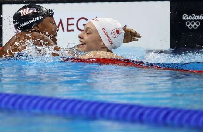 Oleksiak and Manuel tie for 100m free gold