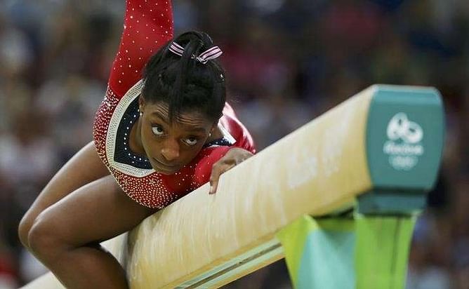 Biles beam slip crushes five-gold dream