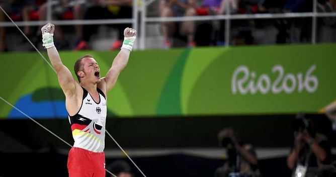 Gymnastics: Hambuechen wins horizontal bar gold
