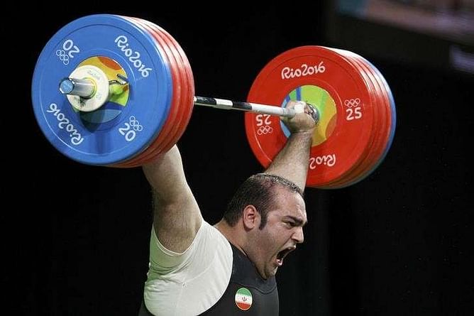 Weightlifting - Georgian lifts gold as Iran cry foul