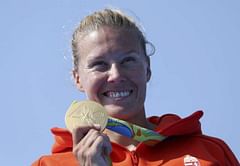 Canoe Sprint - Hungary's Kozak paddles her way to a triple gold