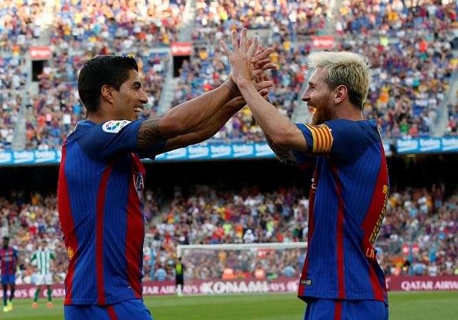 Suarez treble and Messi double lift six-goal Barca