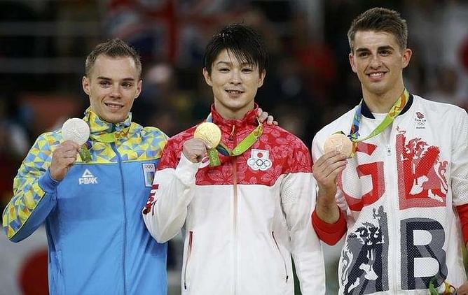 Gymnastics - Biles and Uchimura soar, China crash
