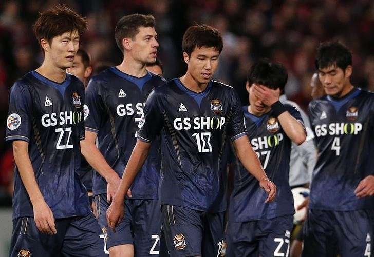FC Seoul players react after losing their Asian Champions League soccer semi-final game against the Western Sydney Wanderers at Parramatta Stadium October 1, 2014. REUTERS/David Gray/Files