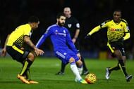 WATFORD, ENGLAND - FEBRUARY 03: Cesc Fabregas of Chelsea passes as Troy Deeney of Watford and Odion Ighalo of Watford close in during the Barclays Premier League match between Watford and Chelsea at Vicarage Road on February 3, 2016 in Watford, England. (Photo by Clive Mason/Getty Images)