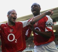 LONDON - NOVEMBER 13: Patrick Vieira of Arsenal celebrates his goal with Freddie Ljungberg during the Barclays Premiership match between Tottenham Hotspur and Arsenal at White Hart Lane on November 13, 2004 in London, England. (Photo by Ian Walton/Getty Images)