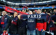 MANCHESTER, ENGLAND - APRIL 12: PSG fans show their support prior to the UEFA Champions League quarter final second leg match between Manchester City FC and Paris Saint-Germain at the Etihad Stadium on April 12, 2016 in Manchester, United Kingdom. (Photo by Clive Brunskill/Getty Images)