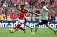 MUNICH, GERMANY - MAY 14: David Alaba of Muenchen (C) is challenged by Manuel Schmiedebach of Hannover during the Bundesliga match between FC Bayern Muenchen and Hannover 96 at Allianz Arena on May 14, 2016 in Munich, Germany. (Photo by Daniel Kopatsch/Getty Images For MAN)