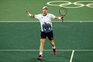 RIO DE JANEIRO, BRAZIL - AUGUST 14: Andy Murray of Great Britain reacts after defeating Juan Martin Del Potro of Argentina to win the gold medal in Men's Singles on Day 9 of the Rio 2016 Olympic Games at the Olympic Tennis Centre on August 14, 2016 in Rio de Janeiro, Brazil. Murray defeated Del Potro 7-5, 4-6, 6-2, 7-5. (Photo by Julian Finney/Getty Images)