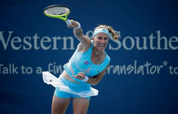 MASON, OH - AUGUST 19:  Svetlana Kuznetsova of Russia hita a return in her quarterfinal match against Karolina Pliskova during day 7 of the Western &amp; Southern Open at the Lindner Family Tennis Center  on August 19, 2016 in Mason, Ohio.  (Photo by Andy Lyons/Getty Images)