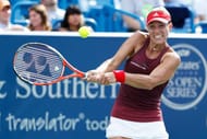 MASON, OH - AUGUST 20: Angelique Kerber of Germany hits a return shot to Simona Halep of Romania during their semifinal match on Day 8 of the Western & Southern Open at the Lindner Family Tennis Center on August 20, 2016 in Mason, Ohio. Kerber defeated Halep 6-3, 6-4. (Photo by Joe Robbins/Getty Images)