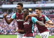 LONDON, ENGLAND - AUGUST 21: Michail Antonio (C) of West Ham United celebrates scoring the opening goal with team mates Ashley Fletcher (L) and Sam Byram during the Premier League match between West Ham United and AFC Bournemouth at London Stadium on August 21, 2016 in London, England. (Photo by Michael Regan/Getty Images)