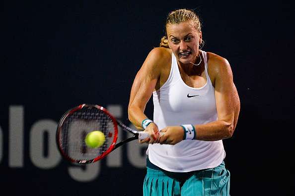 NEW HAVEN, CT - AUGUST 26:  Petra Kvitova of the Czech Republic returns a shot to Agnieszka Radwanska of Poland on day 6 of the Connecticut Open at the Connecticut Tennis Center at Yale on August 26, 2016 in New Haven, Connecticut.  (Photo by Alex Goodlett/Getty Images)