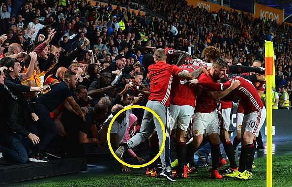 Marouane Fellaini helps woman who was crushed during Manchester United's goal celebration at Hull City