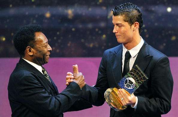 Pele and Cristiano Ronaldo at an awards ceremony