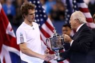NEW YORK, NY - SEPTEMBER 10: Andy Murray of Great Britain receives the US Open championship trophy from the President of the United States Tennis Association Jon Vegosen after defeating Novak Djokovic of Serbia in the men's singles final match on Day Fifteen of the 2012 US Open at USTA Billie Jean King National Tennis Center on September 10, 2012 in the Flushing neighborhood of the Queens borough of New York City. Murray defeated Djokovic 7-6, 7-5, 2-6, 3-6, 6-2. (Photo by Matthew Stockman/Getty Images)