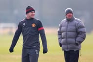MANCHESTER, ENGLAND - MARCH 04: Wayne Rooney of Manchester United and Sir Alex Ferguson look on during a training session at Carrington Training Ground on March 4, 2013 in Manchester, England. (Photo by Alex Livesey/Getty Images)